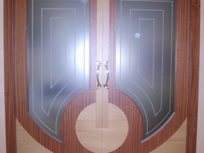 Archisio - Falegnameria Salvioli - Progetto Porta in legno