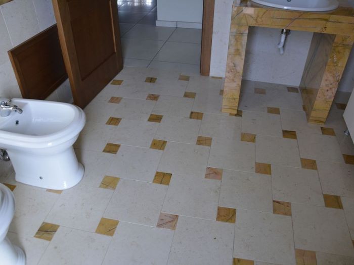 Archisio - Calabra Marmi - Progetto Bagni
