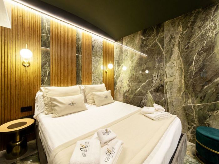 Archisio - Salvatore Sito - Progetto riflessi di marmo e ottone