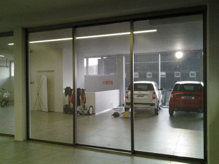 Archisio - Bravo Servizi Aziendali Di Bravo Maurino - Progetto Allestimento interno concessionaria