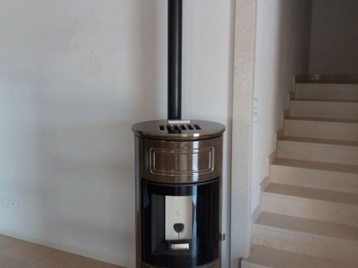 Archisio - Bagno Calore Design - Progetto Stufe e caminetti le nostre realizzazioni