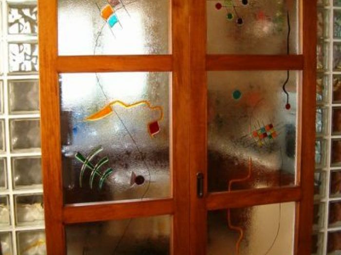 Archisio - Caleidos Creazioni Darte Snc - Progetto Vetrate per porte