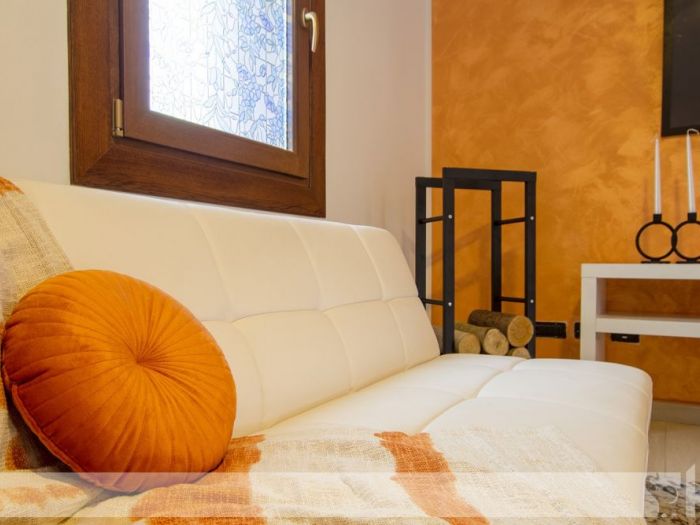 Archisio - Elisa Cattelan - Progetto Da una parete arancione ad uno stile etnic chic