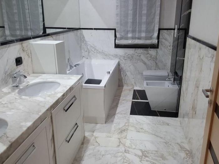 Archisio - Calabra Marmi - Progetto Bagni