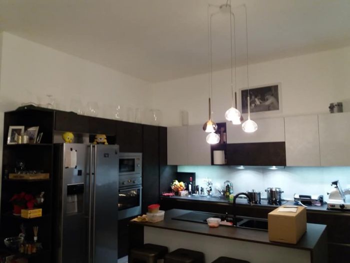 Archisio - Paola Illuminazione - Progetto Illuminazione salone e scale