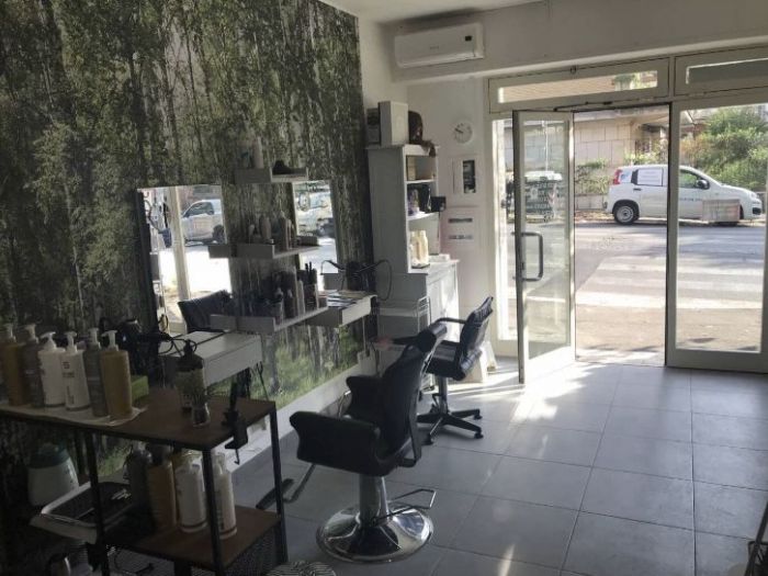 Archisio - Riana Re srl - Progetto Ristrutturazione negozio quartiere montesacro