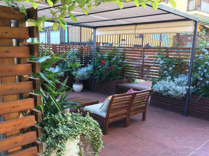 Archisio - Progettare Spazi Verdi - Progetto Legno e colori in terrazza