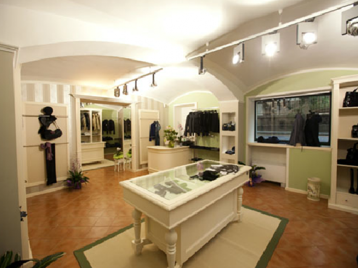 Archisio - Cotto Arredamenti - Progetto Abbigliamento e articoli regalo