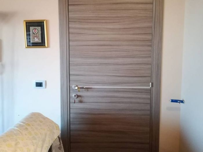 Archisio - Falegnameria Tuccitto - Progetto Porte in legno