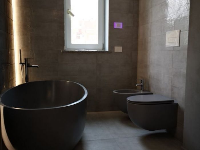 Archisio - Gilardi Interiors On Staging - Progetto Bagno con vasca freestanding e giochi di luce