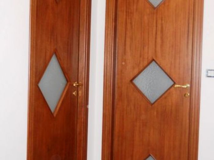 Archisio - Falegnameria Artigianale Riccardi Stefano - Progetto Portoni e porte