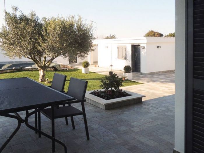 Archisio - Thesign Progettazione Dinterni srl - Progetto Stile minimal