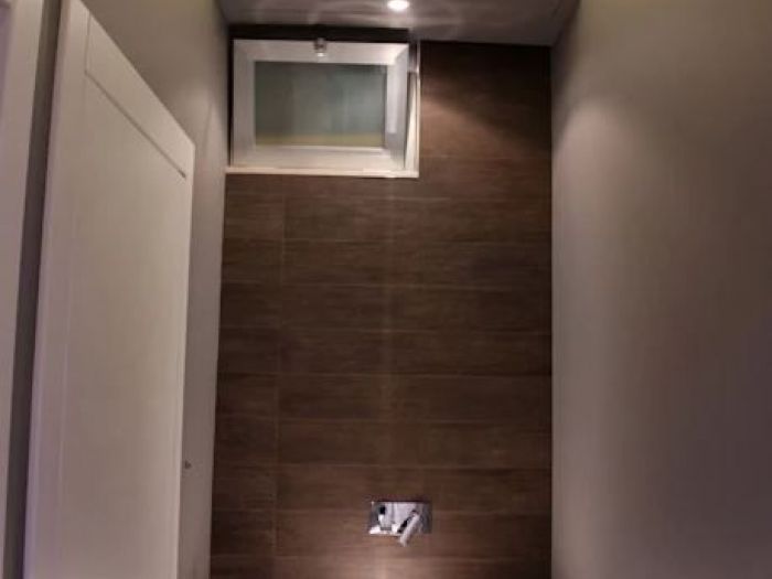 Archisio - Giuseppe Strippoli - Progetto Pizzeria rosticceria la tradizione