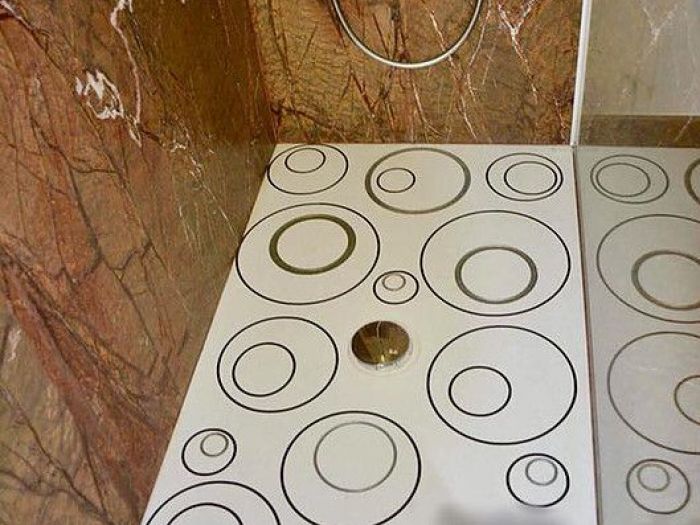 Archisio - Calabra Marmi - Progetto Bagni