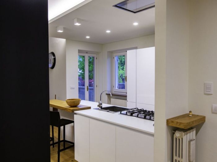 Archisio - Luca Molineri - Progetto Ristrutturazione ed ampliamento di edificio residenziale