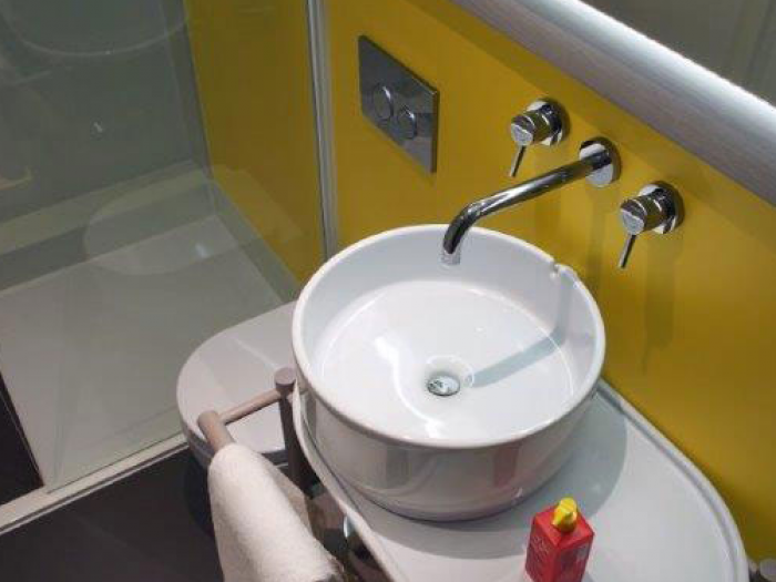 Archisio - Olympia Ceramica srl - Progetto London amsterdam qbic hotel