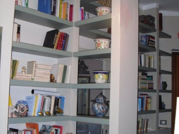 Archisio - Falegnameria Odino Egidio - Progetto Armadi librerie porte e scale