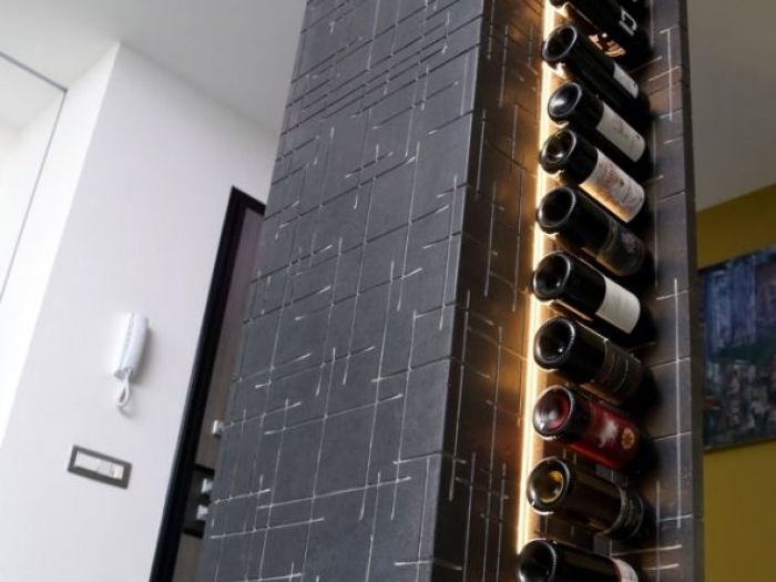 Archisio - Pierfrancesco Arnone - Progetto Progetto di ristrutturazione di un immobile su 2 livelli sviluppato per una coppia giovane abituata a viaggiare in giro per il mondo capace di fondere stili e idee