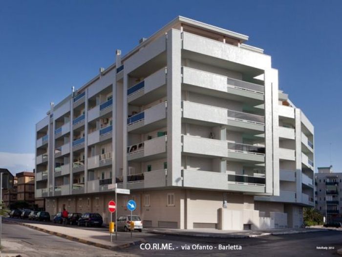 Archisio - Corime - Progetto Realizzazione di un edificio residenziale in edilizia privata e realizzazione di un edificio residenziale in edilizia convenzionata