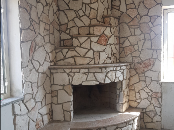 Archisio - Impresa Sharon Srls - Progetto Appartamentiville lavorazione mattoni faccia a vista e rivestimenti in pietra