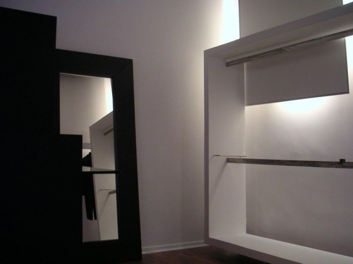 Archisio - Marco Mazzella - Progetto Interni negozio rg