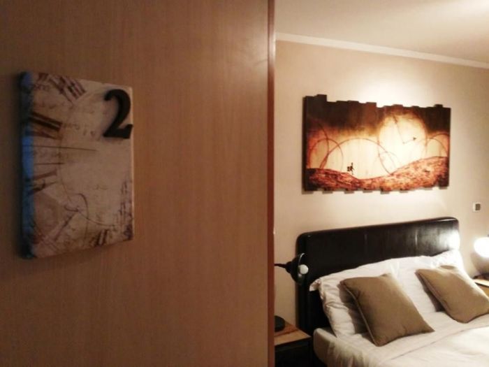 Archisio - Edodesign - Progetto Quadri presso hotel carouge e vicolo 39