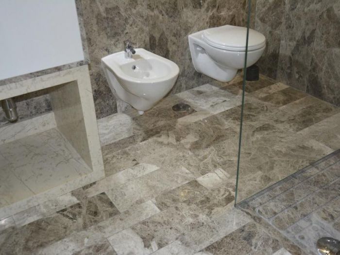 Archisio - Calabra Marmi - Progetto Bagni