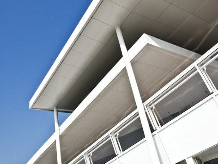 Archisio - Studio Merlini - Progetto Commercial building - restyling edificio commerciale