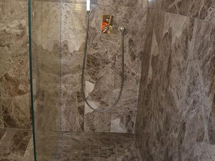 Archisio - Calabra Marmi - Progetto Bagni