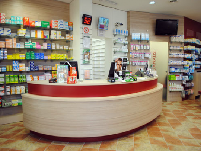 Archisio - Cotto Arredamenti - Progetto Arredamenti per farmacie e parafarmacie gelaterie