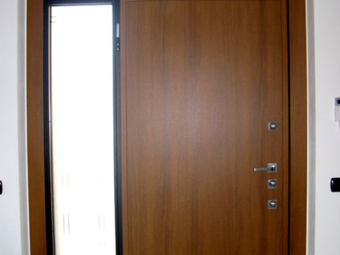 Archisio - Rocca Pierangelo - Progetto Porta in legno