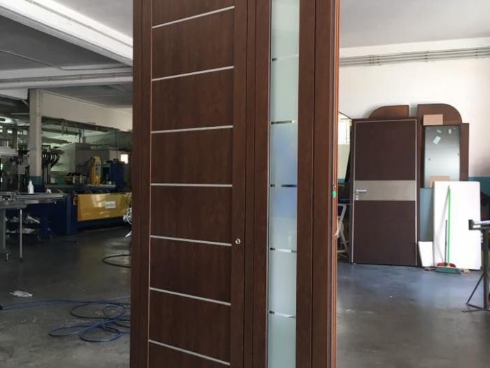 Archisio - Cosmai Infissi - Progetto Portoni