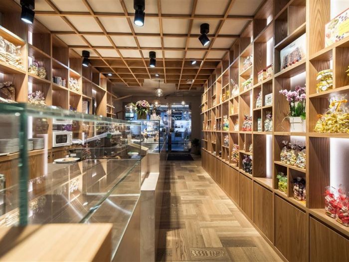 Archisio - Noa Network Of Architecture - Progetto Hofer da 1845 pasticceria ricca di tradizioni con atmosfera moderna