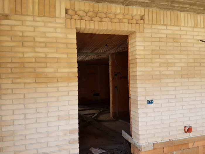 Archisio - Impresa Sharon Srls - Progetto Appartamentiville lavorazione mattoni faccia a vista e rivestimenti in pietra