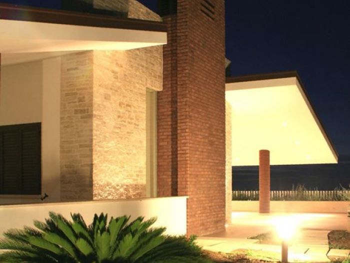 Archisio - Vincenzo Bafunno - Progetto Villa in pietra by night