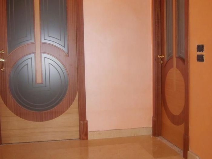 Archisio - Falegnameria Salvioli - Progetto Porta in legno