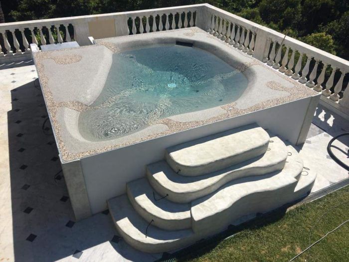 Archisio - Costruzioni Trivellato Di Mauro Trivellato C Snc - Progetto Intonaci stampati pavimentazioni esterne in deco spray pavimentazioni e rivestimenti in microcemento paratie a tenuta stagna rocce artificiali