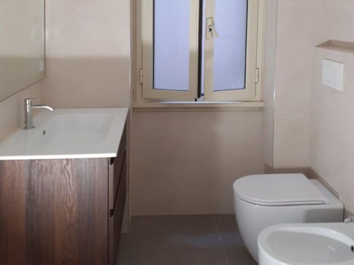 Archisio - Mani Srl Ristrutturazini - Progetto Bagno con vano lavatrice ed asciugatrice