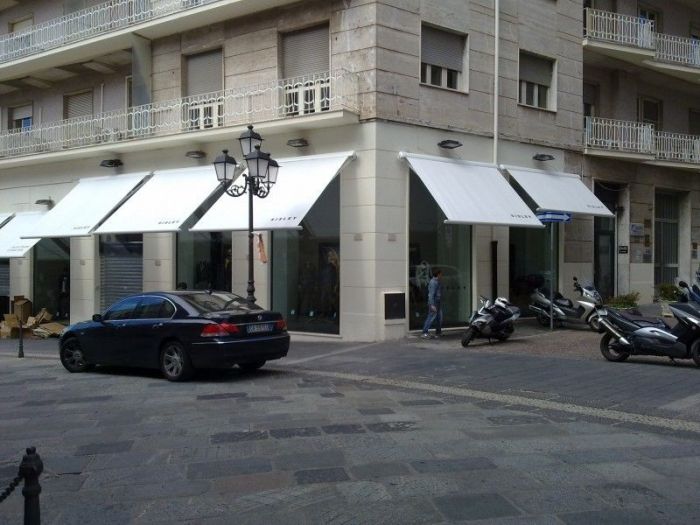 Archisio - Errico Gaglianese - Progetto Realizzazione punti vendita benetton e sisley di catanzaro