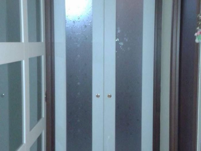 Archisio - Falegnameria Salvioli - Progetto Porta in legno scorrevole