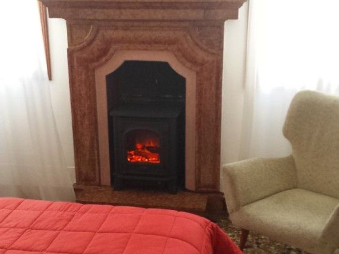 Archisio - Bagno Calore Design - Progetto Stufe e caminetti le nostre realizzazioni