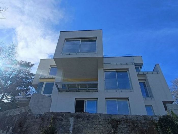 Archisio - Flavio Di Fiore - Progetto Trasformazione di due ville del 1974 in case vacanza