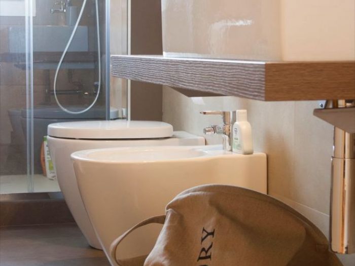 Archisio - Studio Ferretti - Progetto Da ufficio a residenza