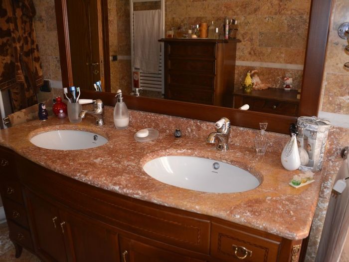 Archisio - Calabra Marmi - Progetto Bagni