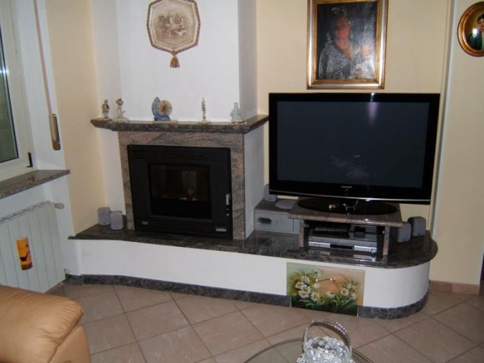 Archisio - Carpenteria Fabbro Alma - Progetto Marmo per camini