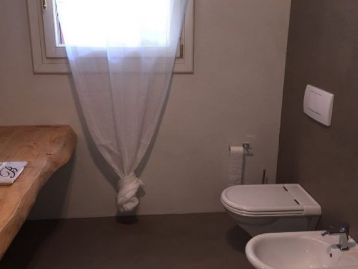 Archisio - Sofim Srl Soluzioni E Finiture Immobiliari - Progetto Pavimenti in microcemento e resina bagni in microcemento