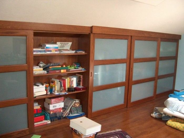 Archisio - Falegnameria Odino Egidio - Progetto Armadi librerie porte e scale