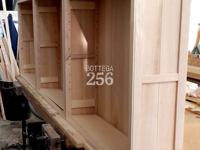 Archisio - Bottega 256 - Progetto Eco-libreria frassino massello