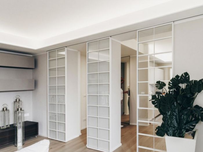 Archisio - Vi Studio Di Architettura - Progetto Casa con sipari scorrevoli