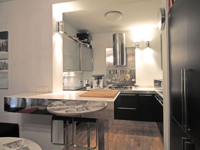 Archisio - Diletta Evangelisti - Progetto Bilocale con dettagli in vetro e metallo argento